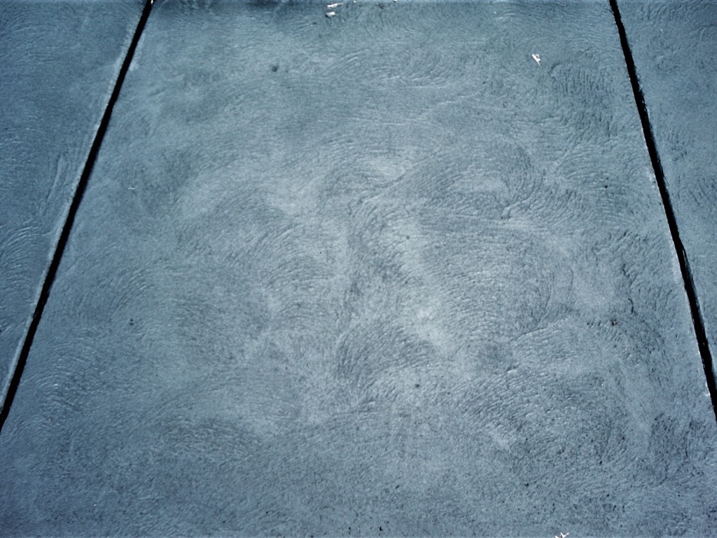 Hit and miss cove concrete driveway finish
